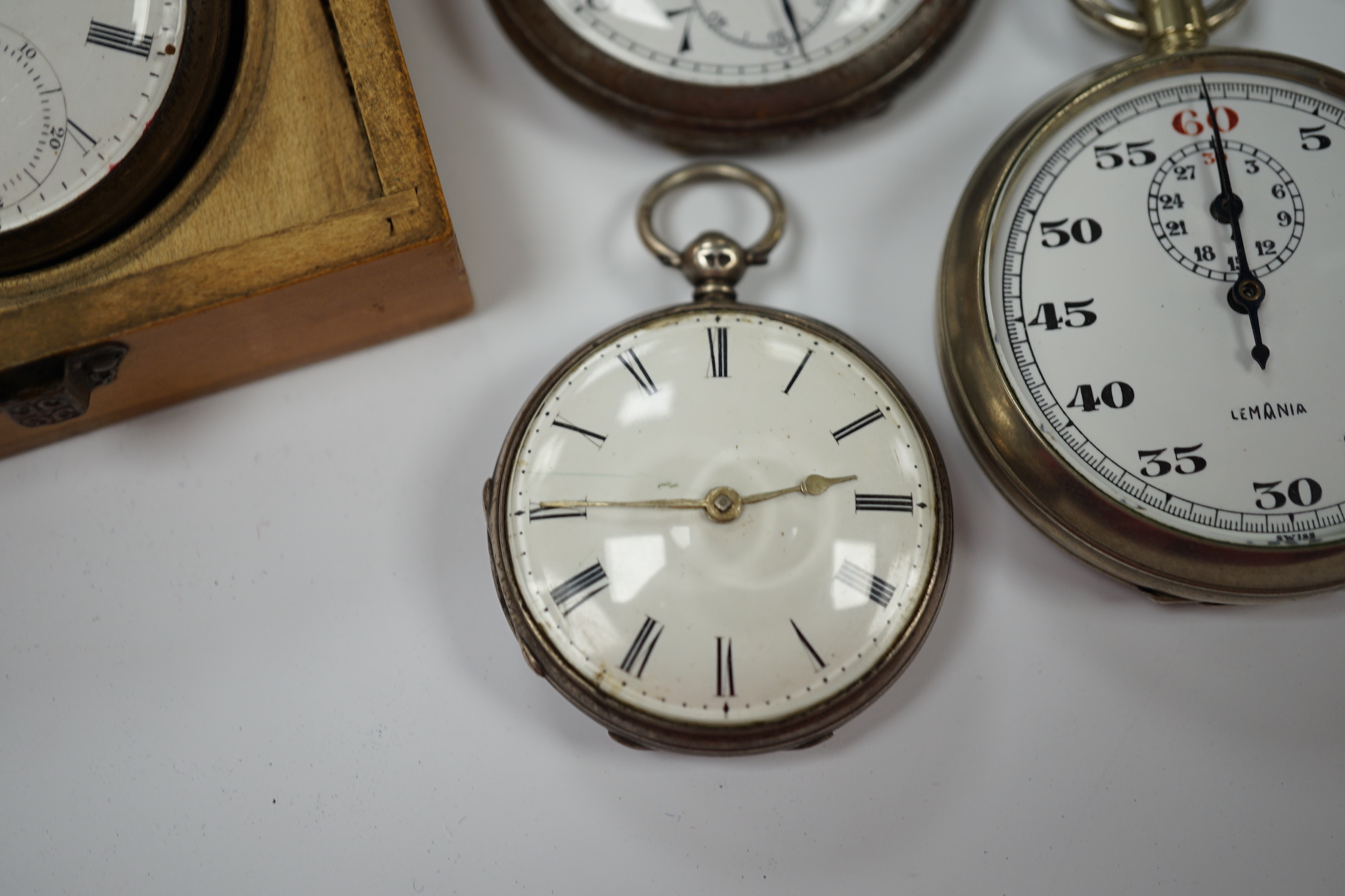 A Victorian silver open faced pocket watch, a silver fob watch, one other base metal pocket watch and a metal cased Lemania GPO stop watch, together with a base metal albert with spinning fob.